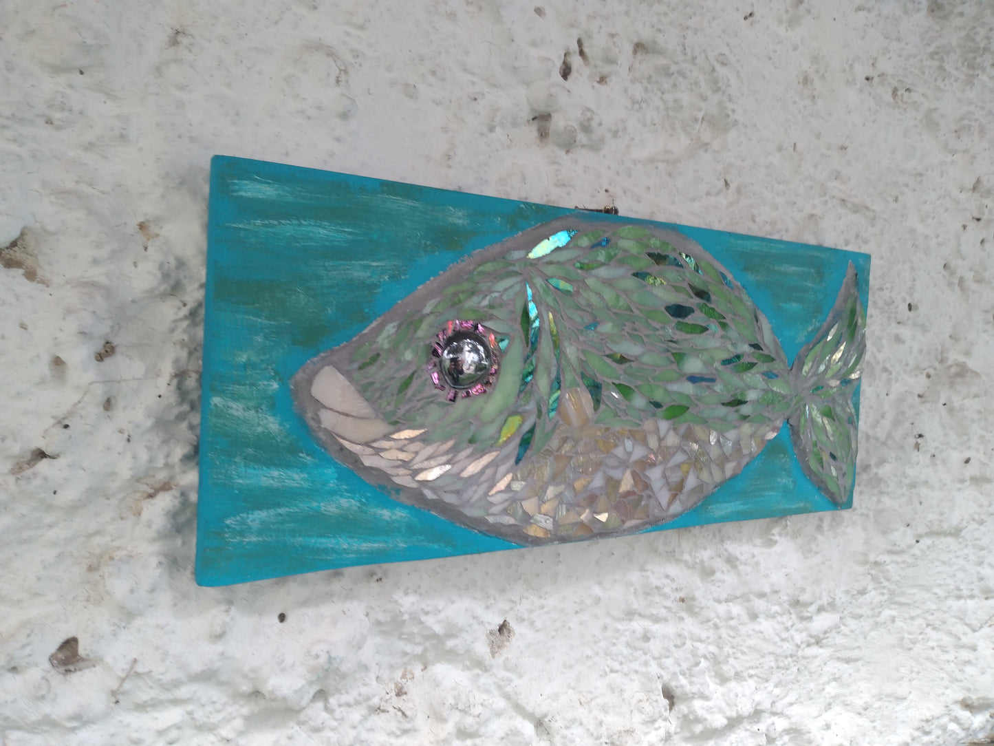 GREEN FISH IN TURQUOIZE WATERS