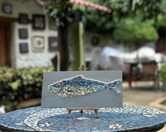 BLUE FISH IN GREY WATERS